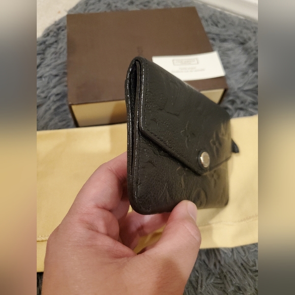 Louis Vuitton Monogram Empreinte key pouch in black - Picture 15 of 16
